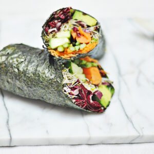 Grain free wrap with a lot of veggies and salads inside.