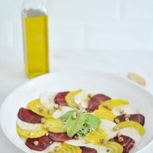 A yellow, red and white beetroot carpaccio