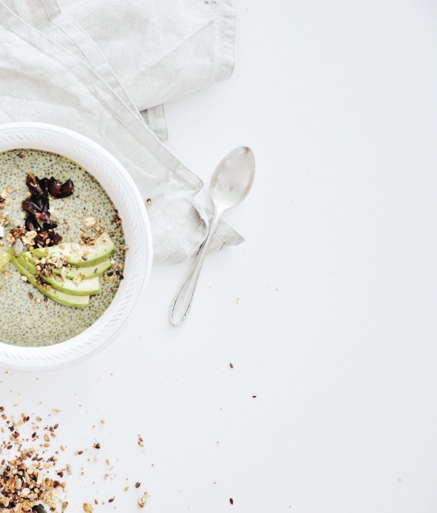 Matcha bowl with dates and avocado topping.