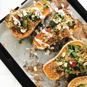 Stuffed Butternut squash with a mediterranean couscous filling. So good!