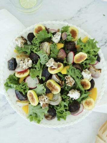 Fulfilling salad with baked potatoes and creamy avocado sauce