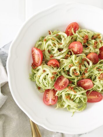 Pesto zucchini noodles with fresh and dried tomatoes