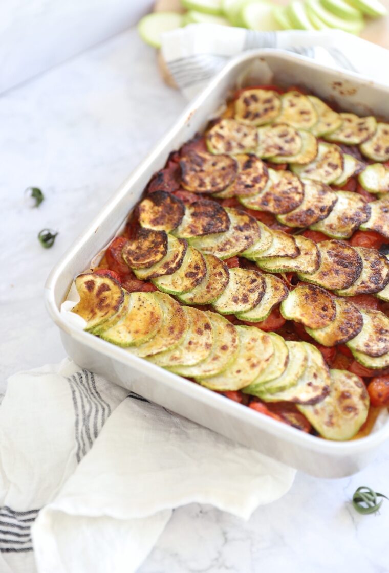 Vegan baked polenta with tomato compote and roasted zucchini