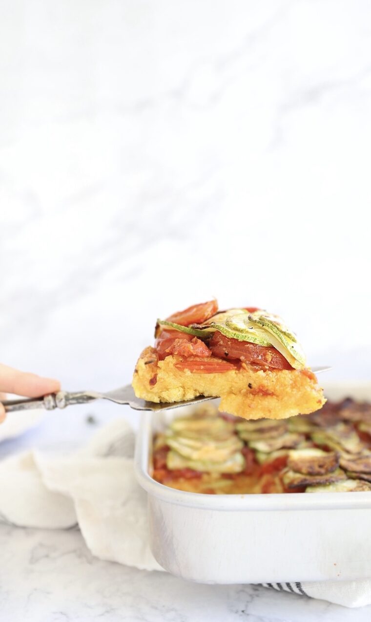 Vegan baked polenta with tomato compote and roasted zucchini